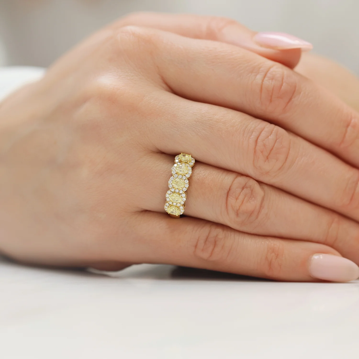 18ct Yellow Gold Oval Cut Yellow Diamond Five Stone Eternity Ring With Diamond Halo Surround - Image 2