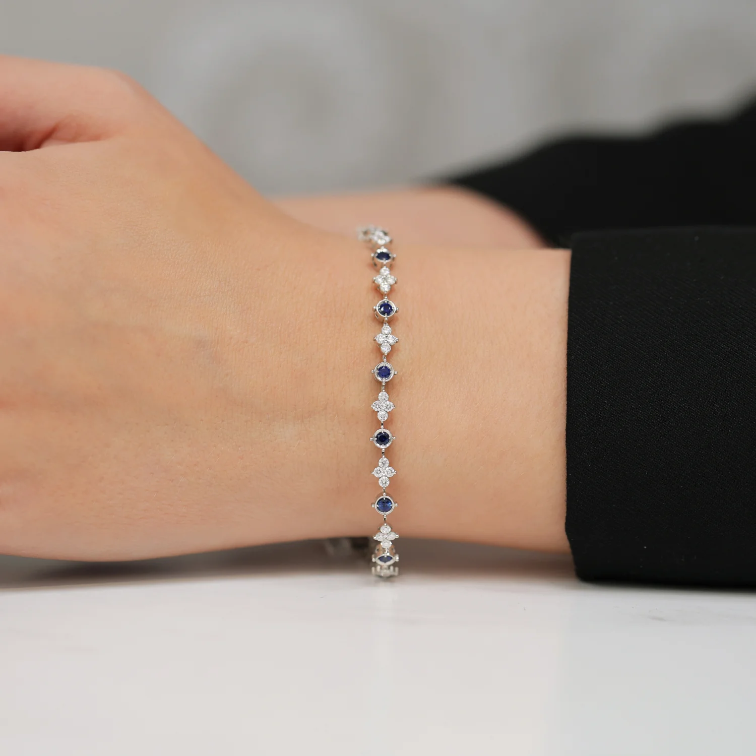 18ct White Gold Diamond And Sapphire Flower Tennis Bracelet - Image 3