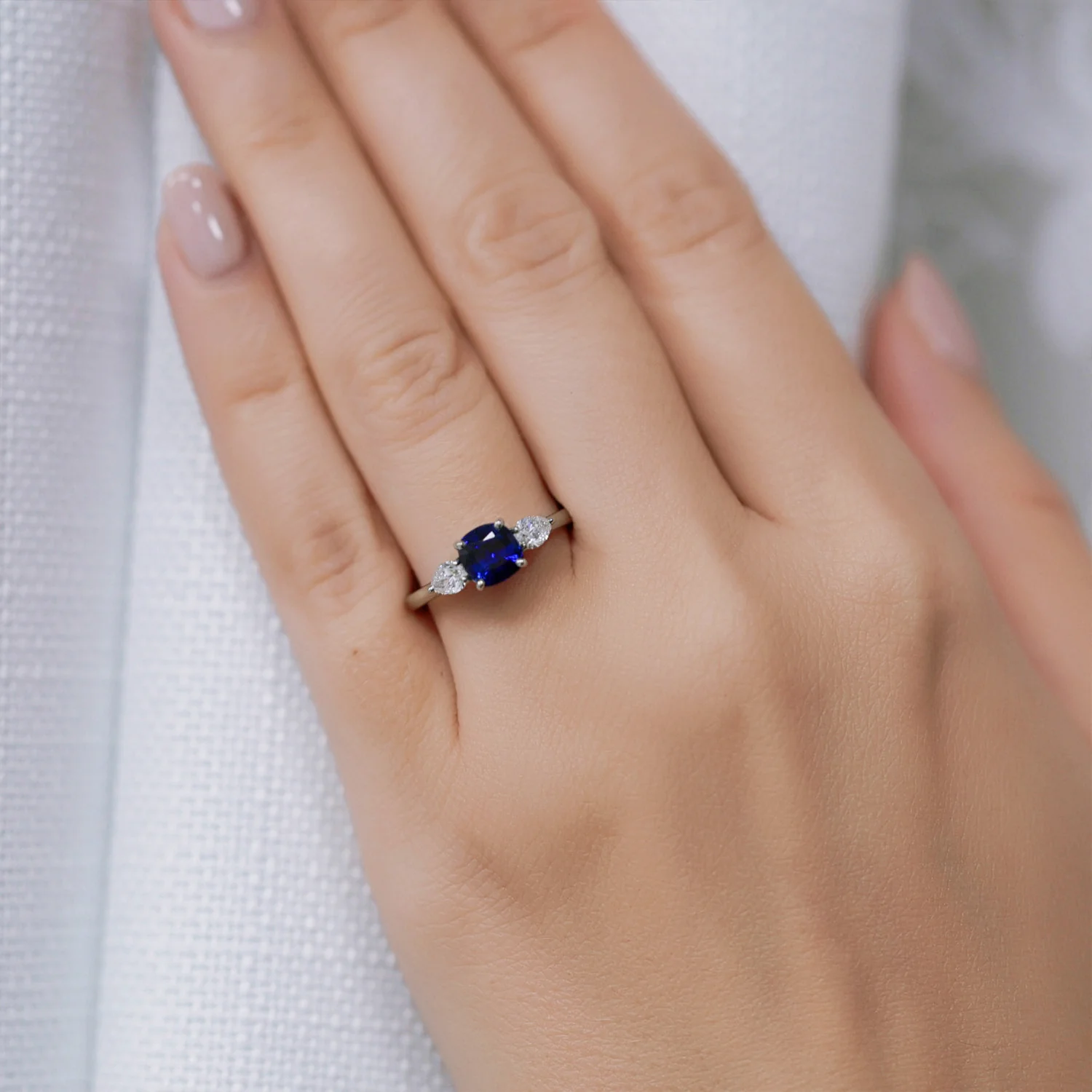 Platinum Cushion Cut Blue Sapphire & Pear Cut Diamond Three Stone Ring - Image 2