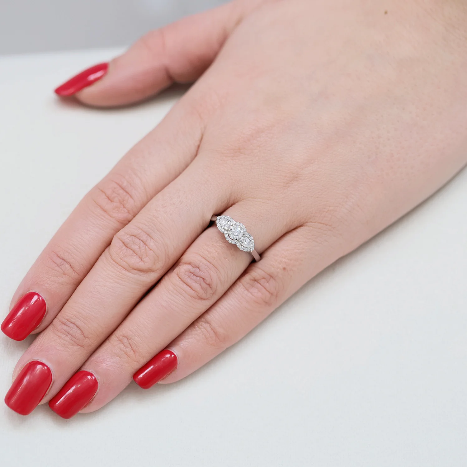 Platinum GIA Certificated Round Brilliant cut and Pear Cut Diamond Halo Three Stone Ring - Image 2