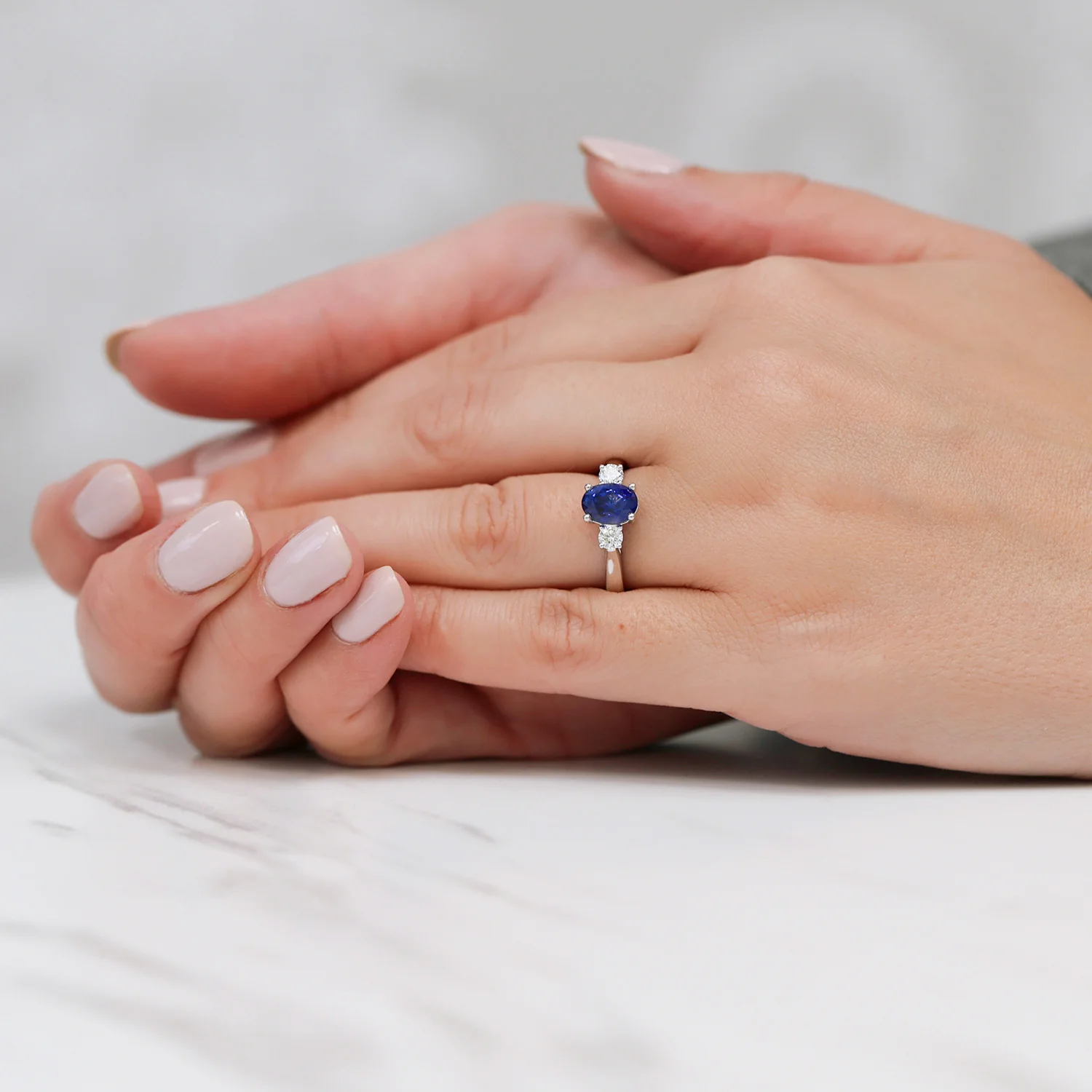 Platinum Oval Blue Sapphire & Round Brilliant Cut Diamond Three Stone Ring - Image 2