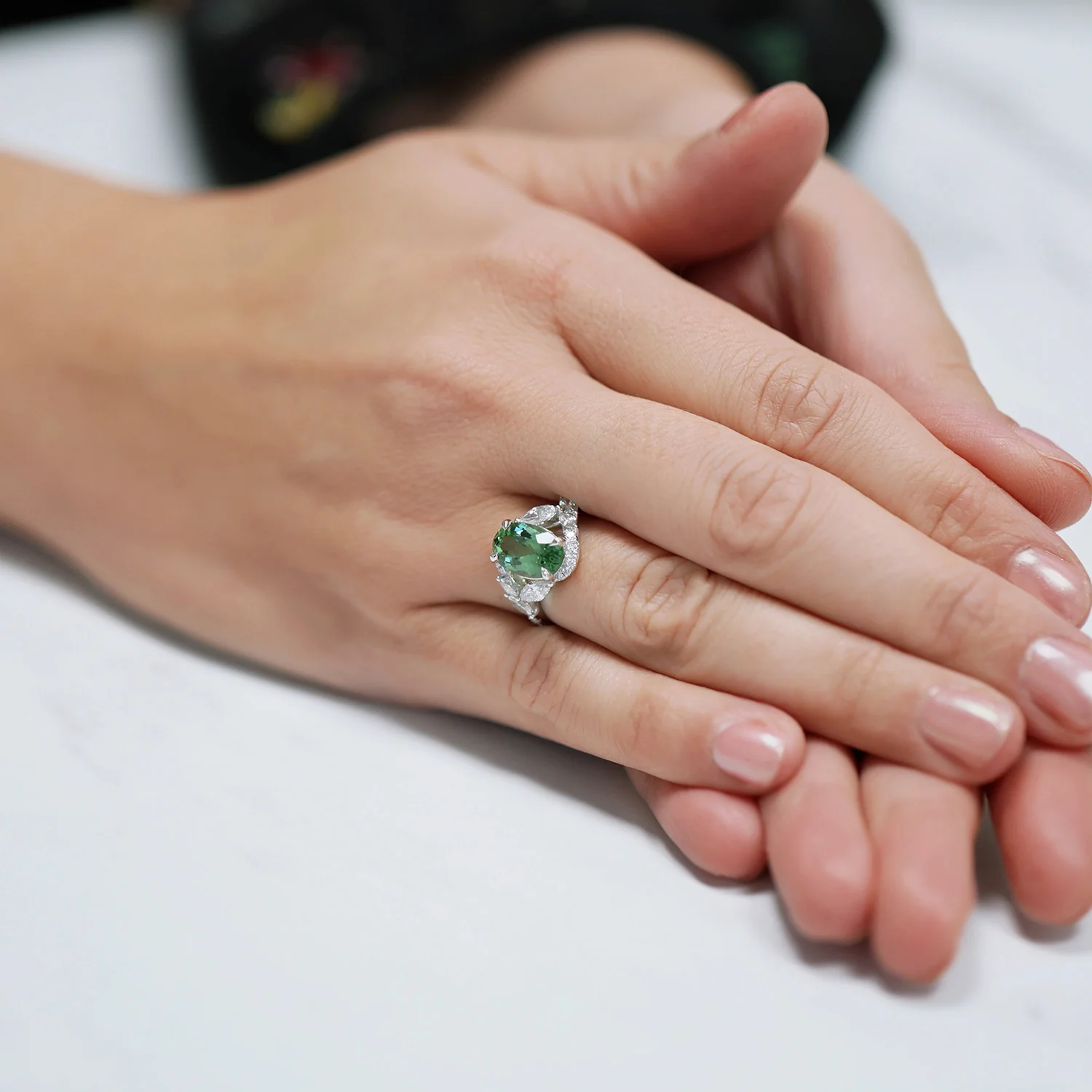 Platinum Oval Cut Green Tourmaline And Marquise And Round Brilliant Diamond Twist Ring - Image 2