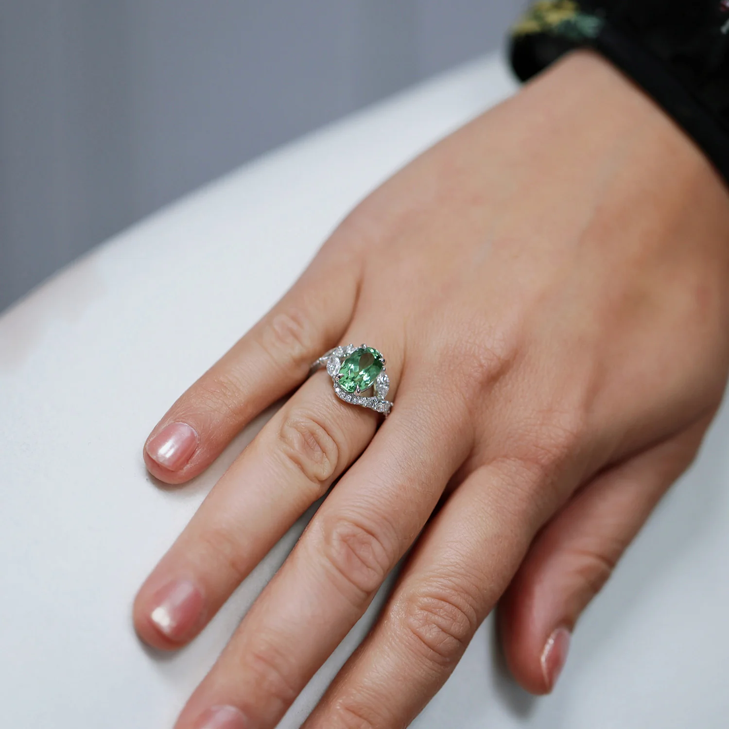 Platinum Oval Cut Green Tourmaline And Marquise And Round Brilliant Diamond Twist Ring - Image 3