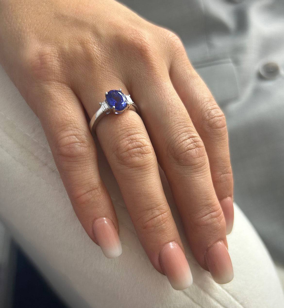 Platinum Oval Cut Tanzanite Ring With Baguette Diamond Shoulders - Image 2