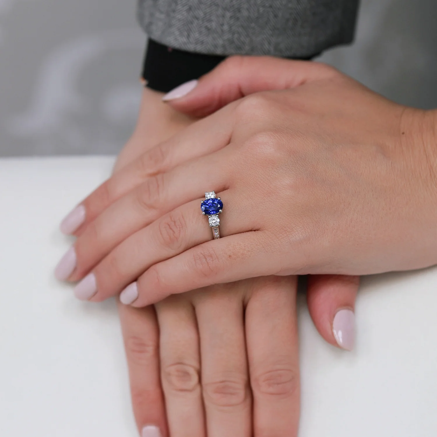 Platinum Oval Sapphire & Diamond Three Stone Ring With Channel Set Diamond Shoulders - Image 2