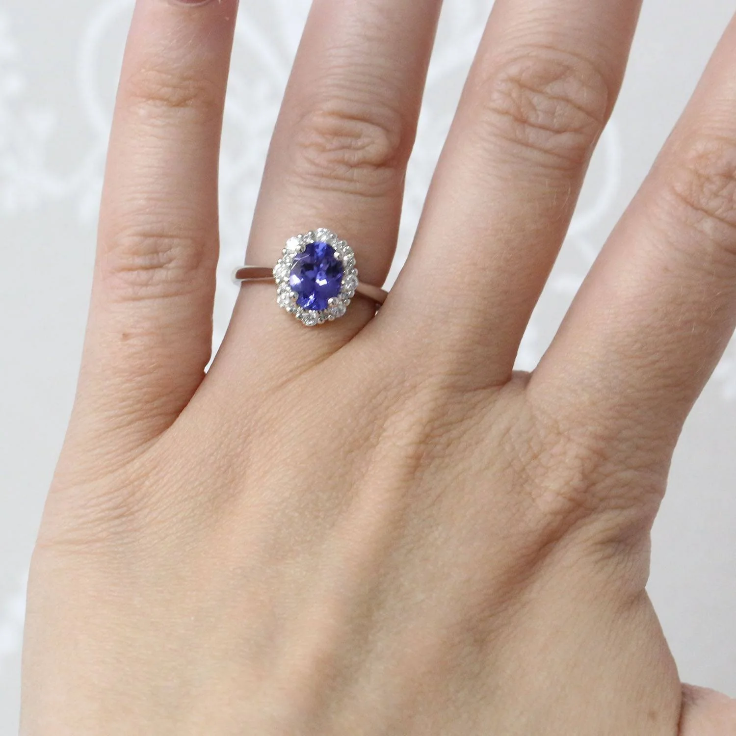 Platinum Oval Tanzanite And Round Brilliant Diamond Cluster Ring - Image 2