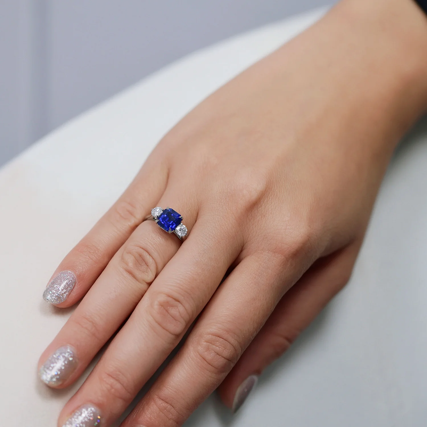 Platinum Rectangular Step Cut Sapphire &  GIA Brilliant Cut Diamond Three Stone Ring - Image 2