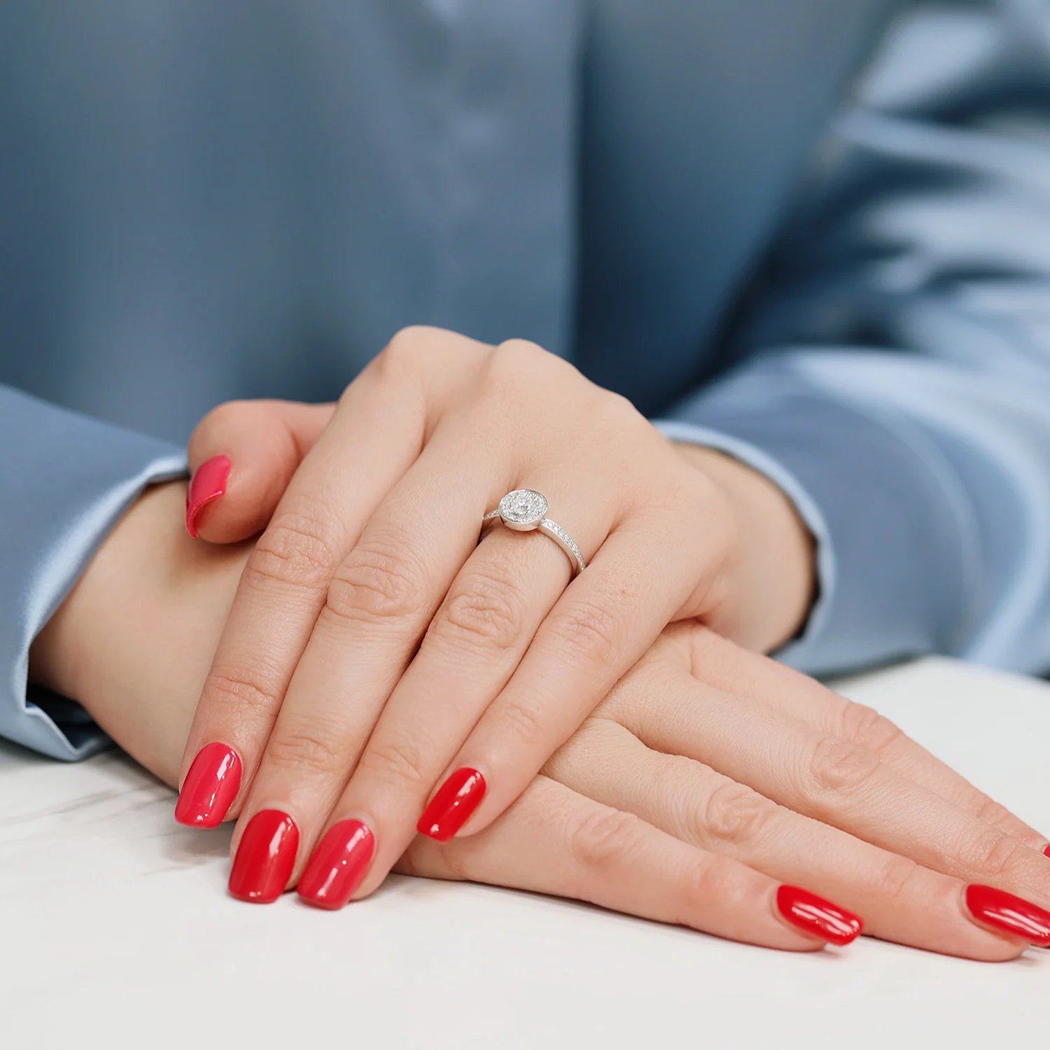 Platinum Round Brilliant Cut Diamond Ring With Diamond Halo and Channel Set Shoulders - Image 4