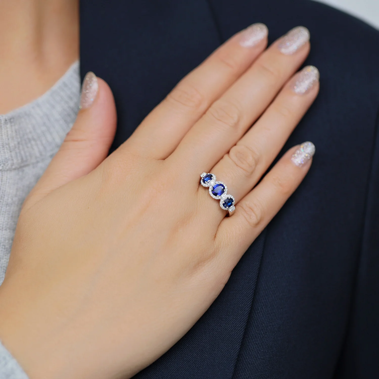 Platinum Round Brilliant Sapphire Fancy Three Stone Ring With A Diamond Halo Surround - Image 3