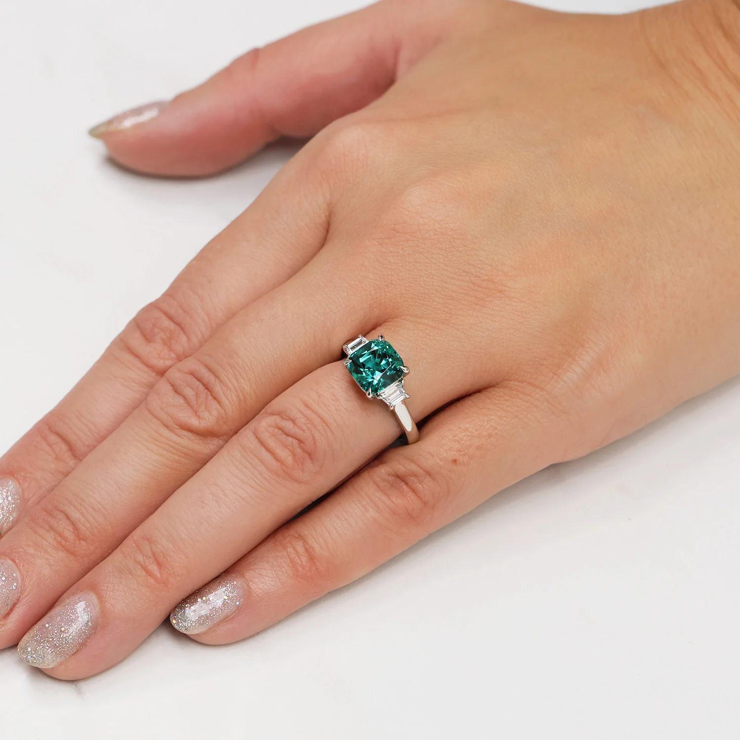 Platinum Cushion Cut Indicolite Tourmaline And Trapeze Cut Diamond Three Stone Ring - Image 2