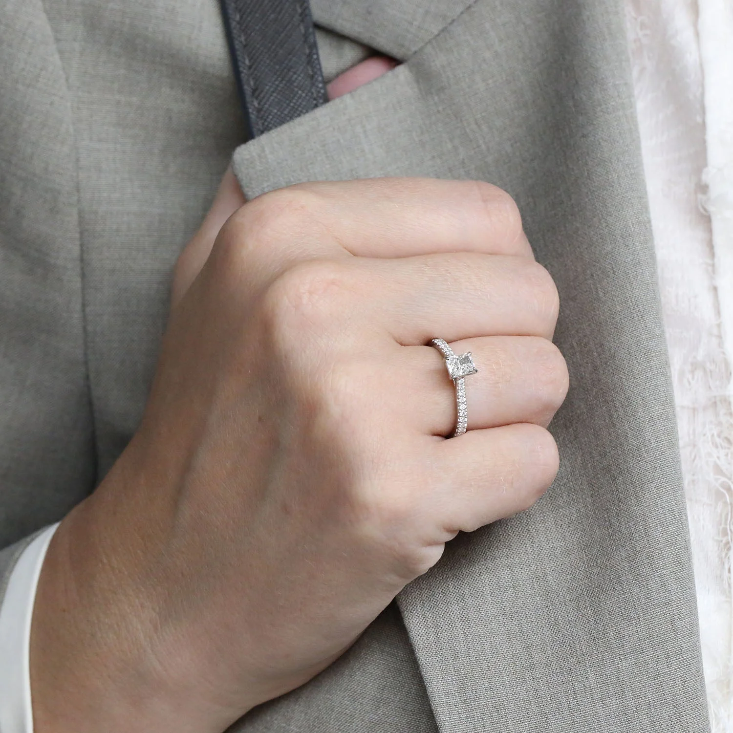 Platinum Emerald Cut Diamond Engagement Ring With Diamond Set Shoulders - Image 4
