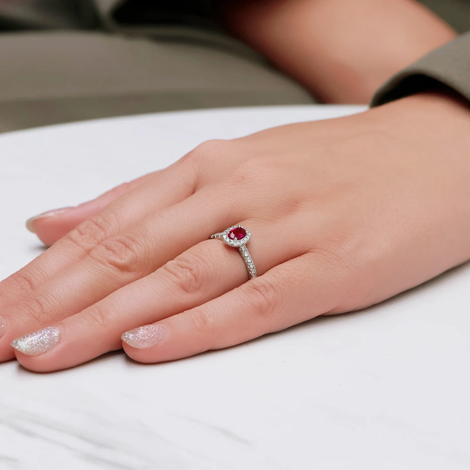 Platinum Oval Cut Ruby In a Diamond Halo Setting With Diamond Set Shoulders - Image 2