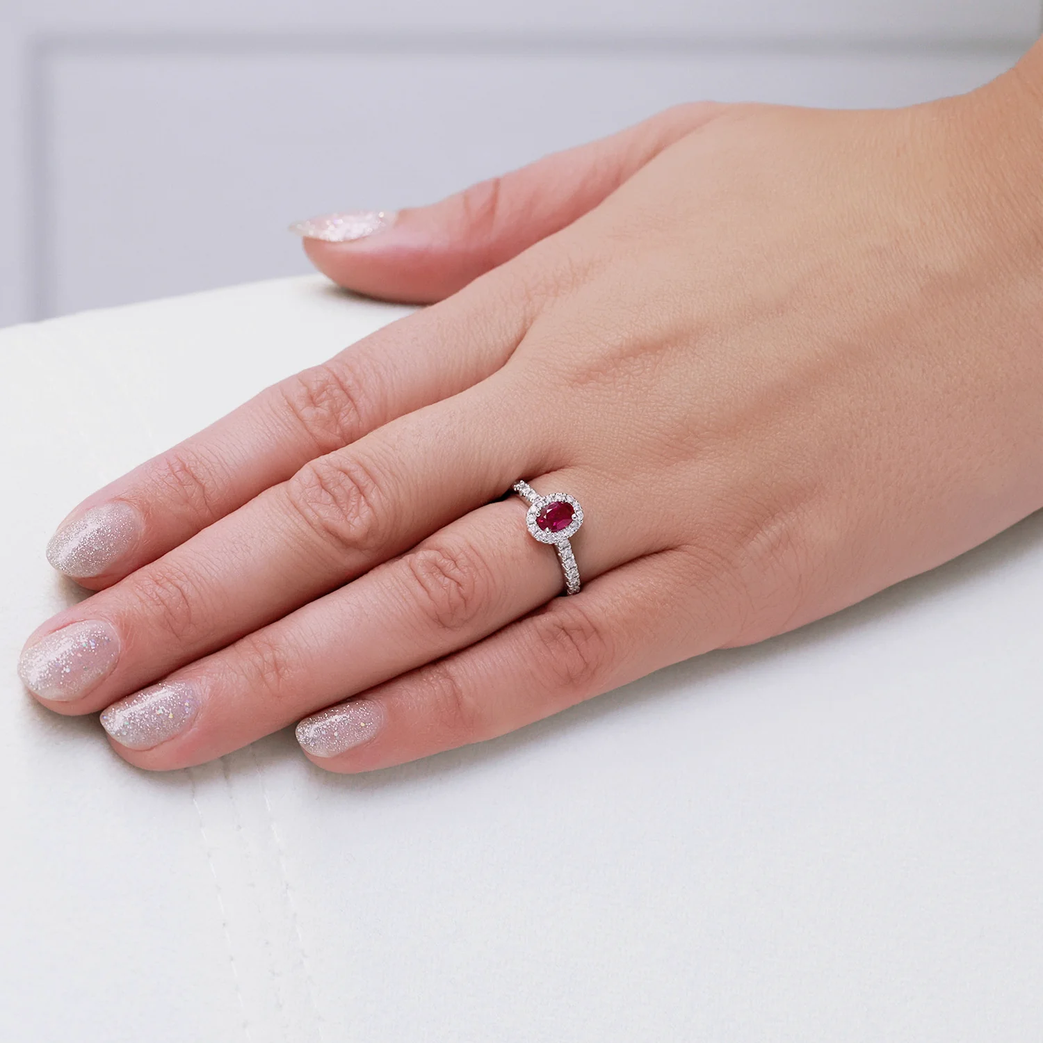Platinum Oval Cut Ruby In a Diamond Halo Setting With Diamond Set Shoulders - Image 3
