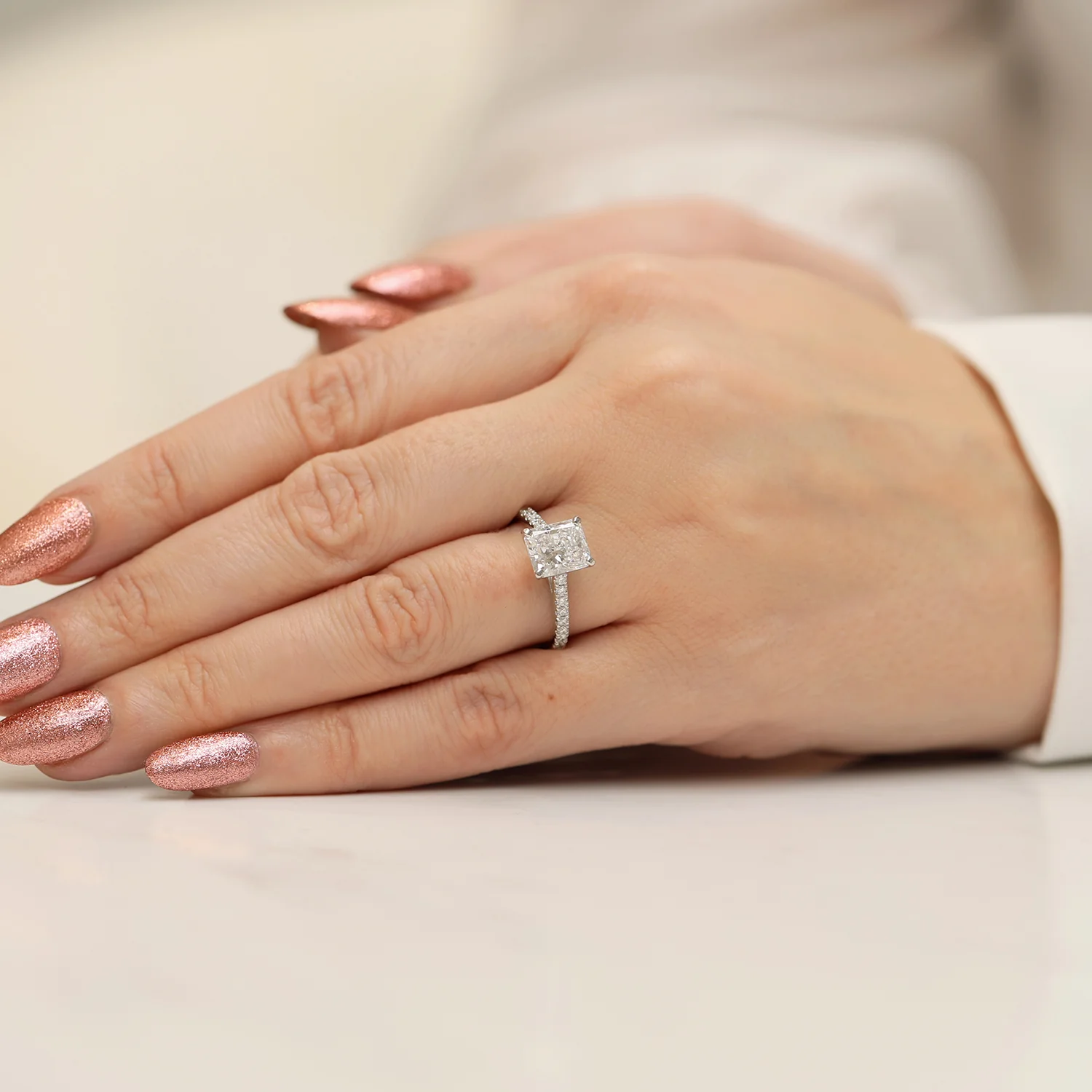 Platinum Radiant Cut Diamond Single Stone Ring With Diamond Shoulders - Image 4