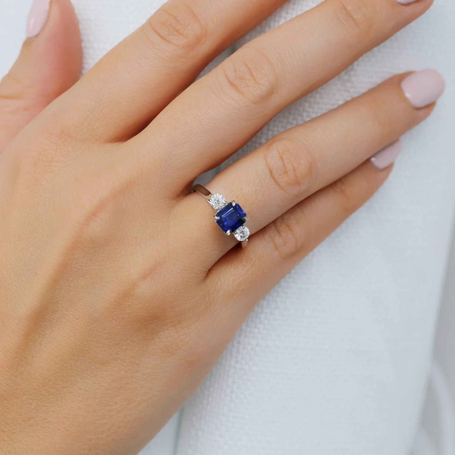 Platinum Rectangular Step Cut Sapphire & Round Brilliant Cut Diamond Three Stone Ring - Image 3