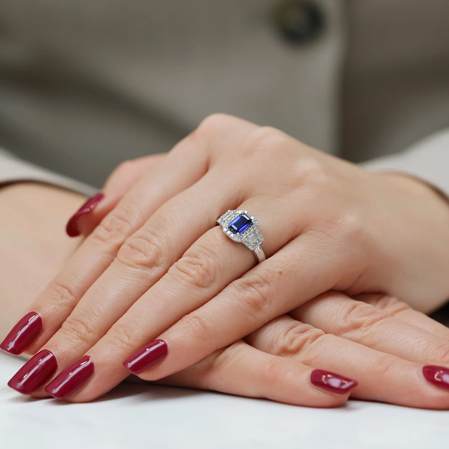 Platinum Sapphire And Baguette Cut Diamond Three Stone Ring With A Halo Surround - Image 2